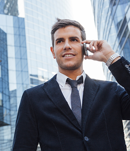 Confident Man Using a Phone